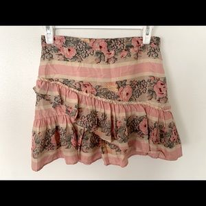 Love Shack Fancy mini skirt!! Pink floral with hints of cream and green